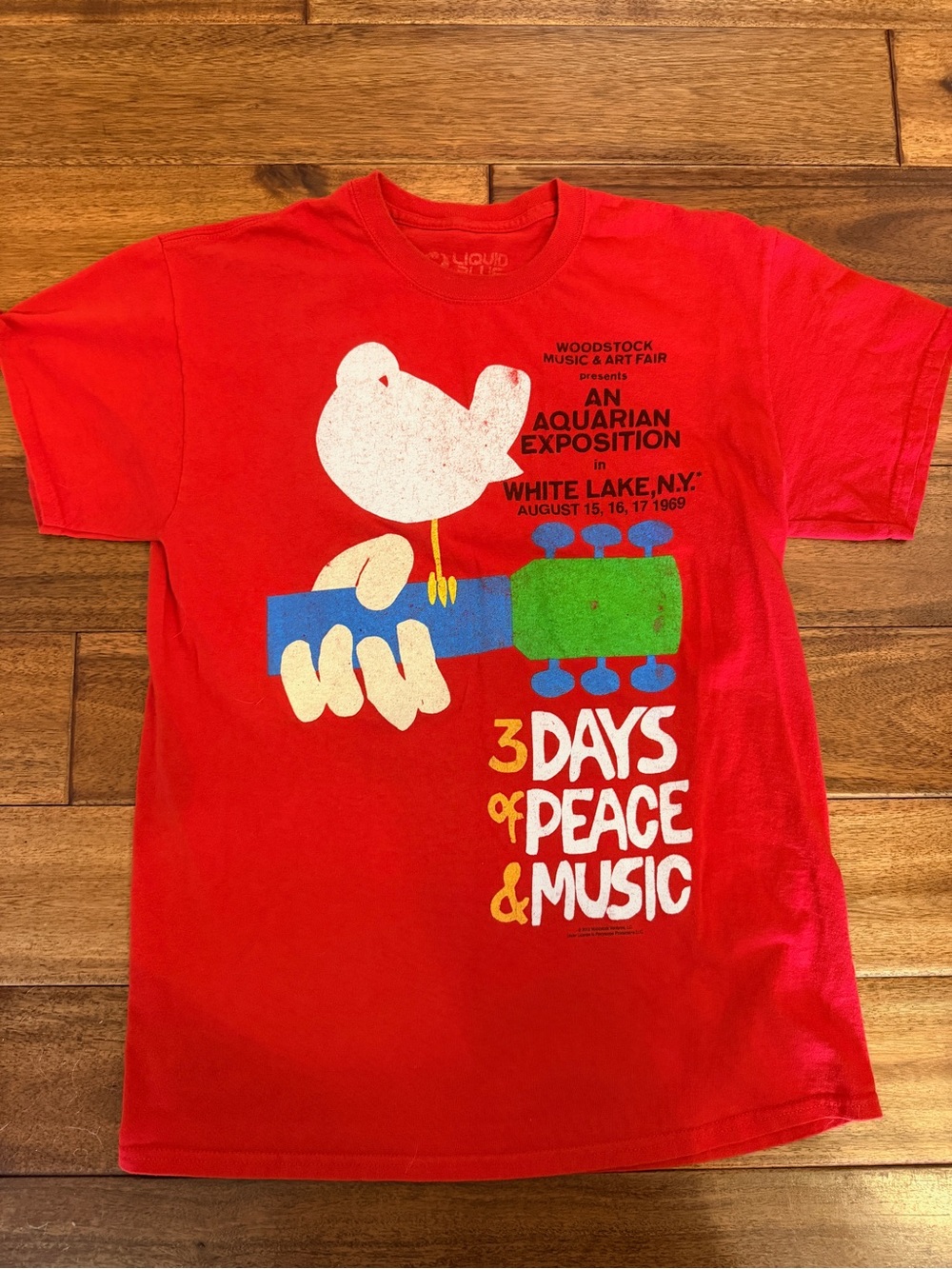 Liquid Blue Unisex design Woodstock '3 Days of Peace & Music' Graphic Tee